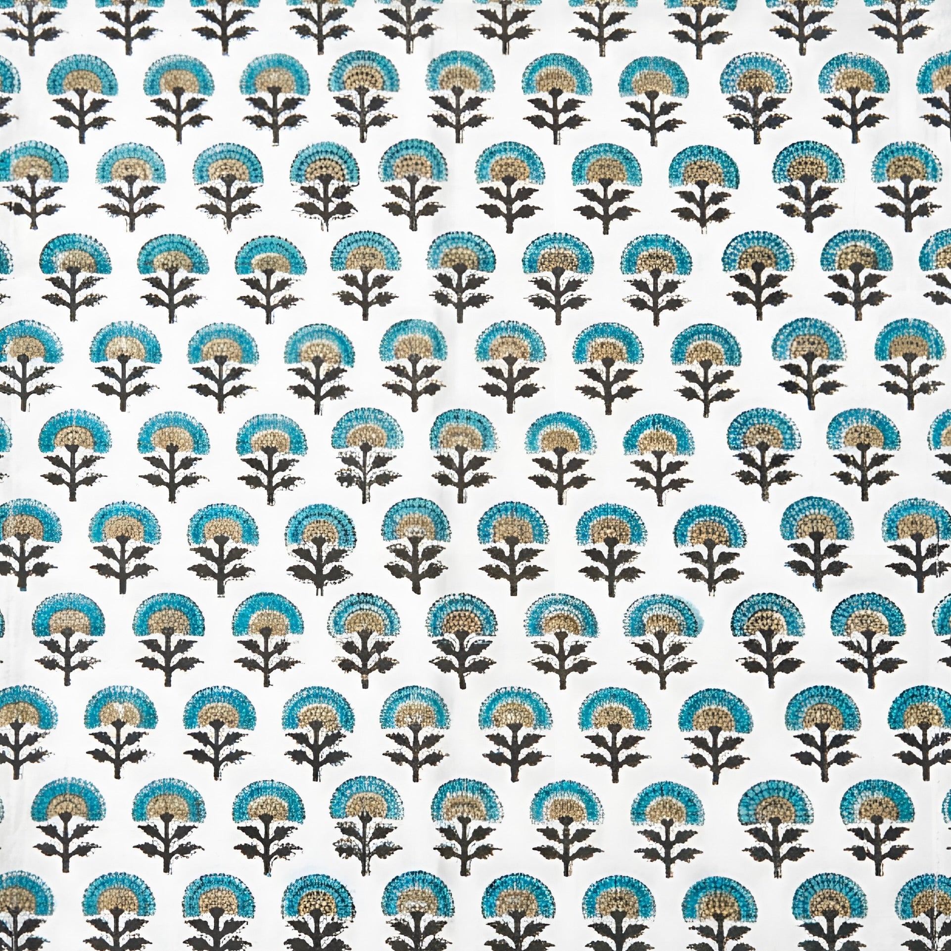 Pattern of blue, black, and beige floral designs on a white background