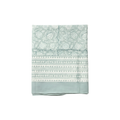 Floral and geometric table cloth on white background. 
