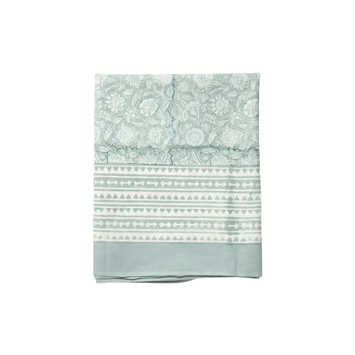 Floral and geometric table cloth on white background. 