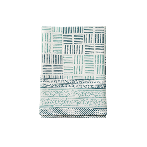 Tablecloth with geometric and floral pattern on a white background.