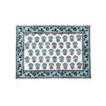 Decorative placemat with floral pattern on a white background