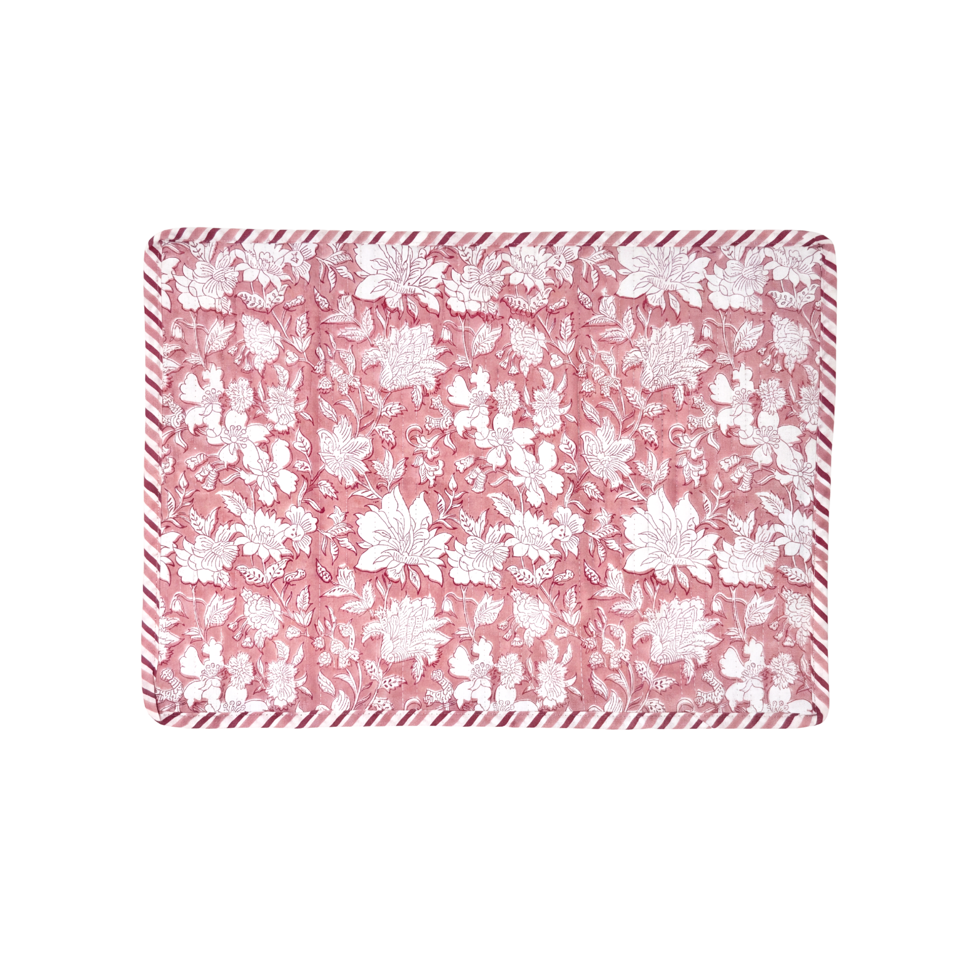 Floral patterned placemat with pink and white design on a white background