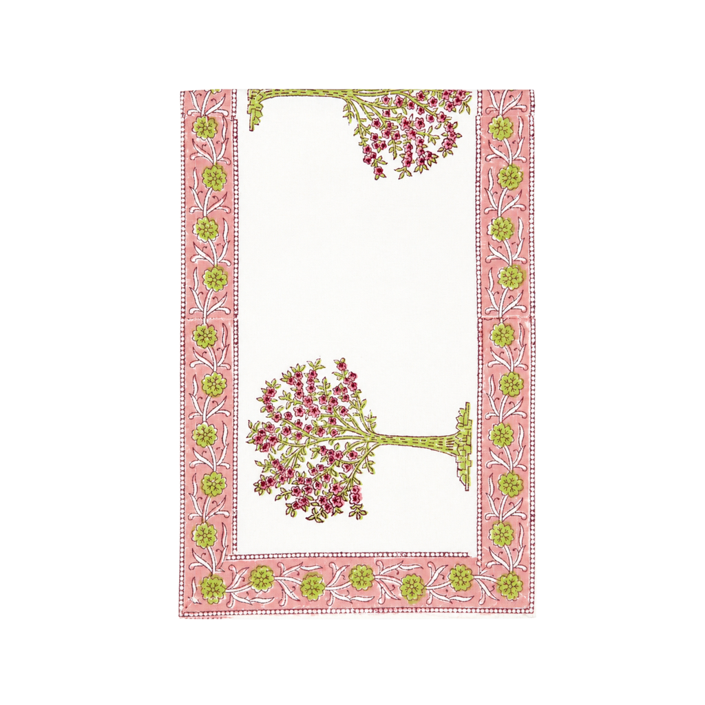 Decorative table runner with floral tree design and border on a white background